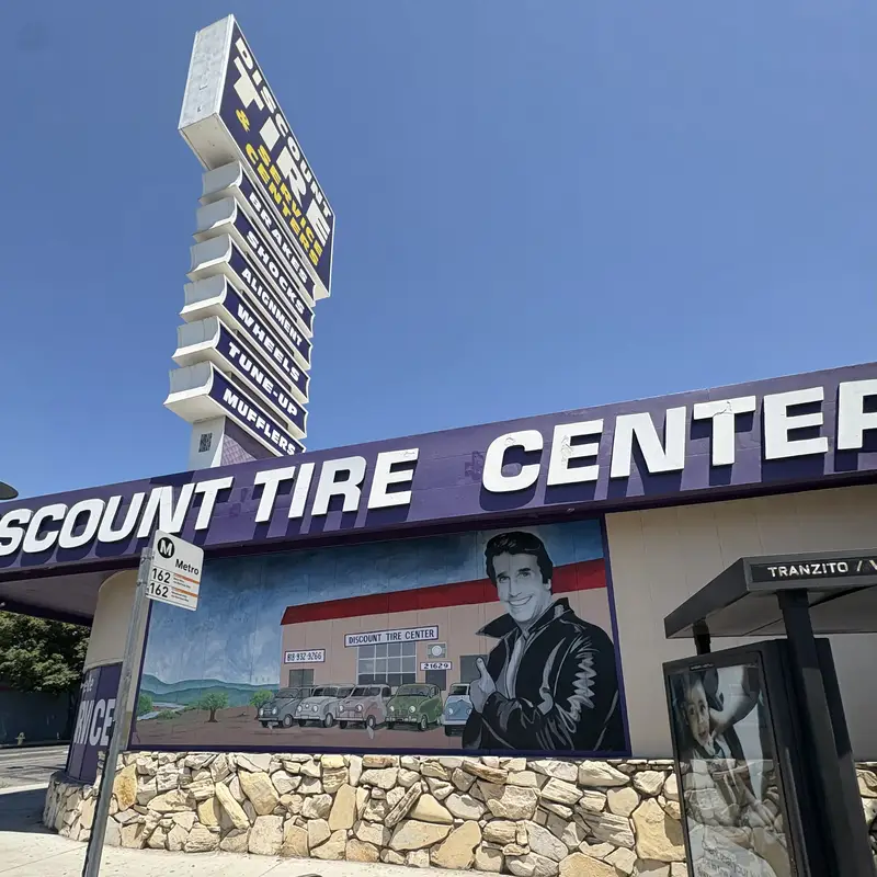 Discount Tire Center with vintage mural on Sherman Way, Canoga Park CA